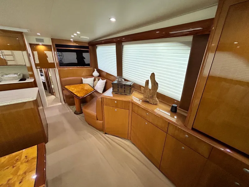 Slide: The Image of Luxurious interior of 2001 Viking 55 Convertible yacht with elegant wood finishes. - 3