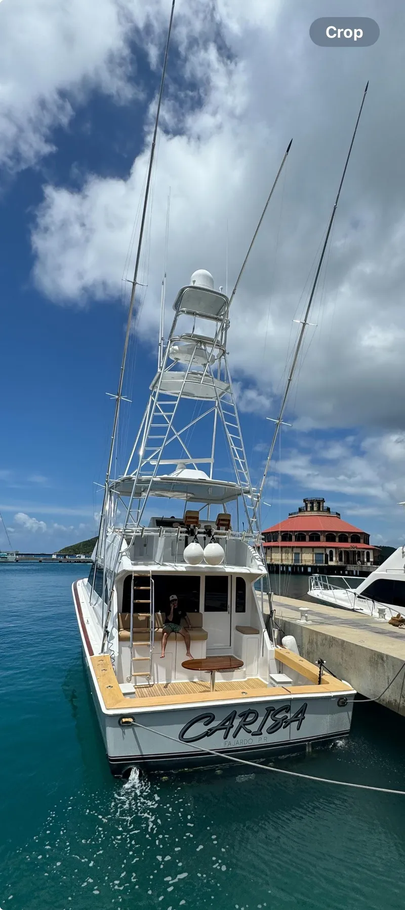 Slide: The Image of 2001 Viking 55 Convertible yacht docked in a sunny marina. - 30