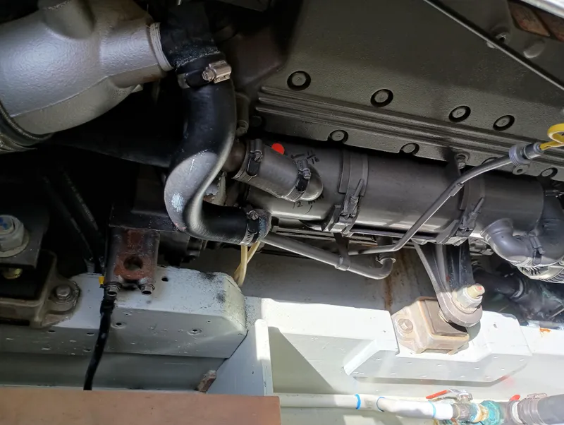 Slide: The Image of Close-up of a 1978 Pacific Bluefin SPF engine component with visible pipes and bolts. - 31