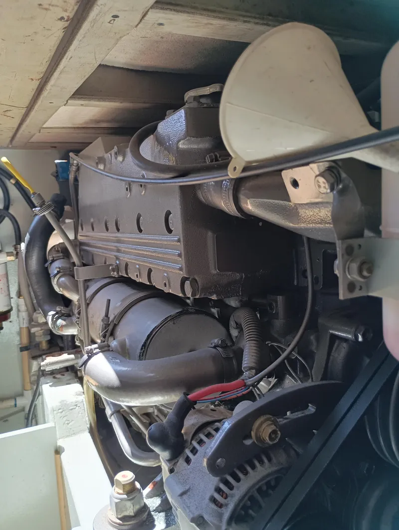 Slide: The Image of Close-up of a 1978 Pacific Bluefin SPF engine in a mechanical setting. - 33