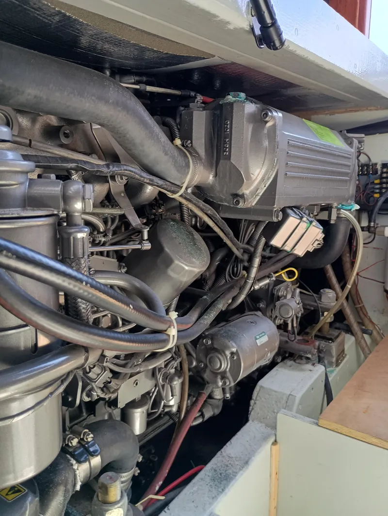 Slide: The Image of Close-up of a 1978 Pacific Bluefin SPF engine with intricate components and wiring. - 35