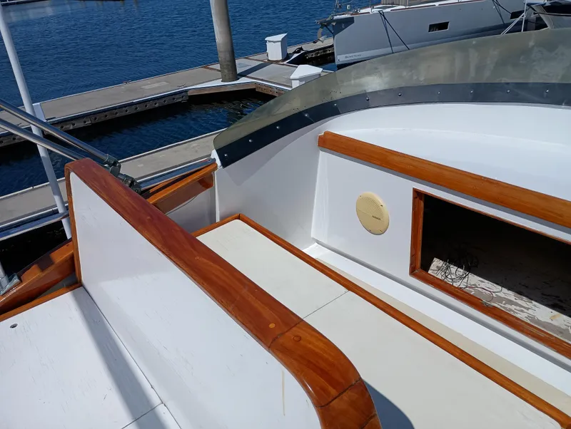 Slide: The Image of 1978 Pacific Bluefin SPF boat deck with wooden trim, docked at marina. - 39