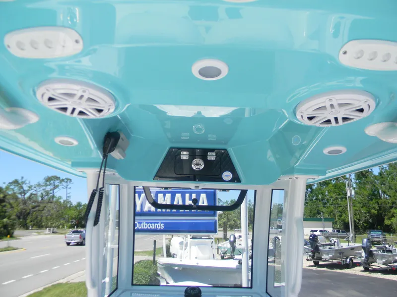 Slide: The Image of 2025 Sportsman Masters 247 Bay Boat interior with speakers and controls. - 31