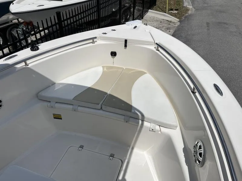 Slide: The Image of 2020 Bulls Bay 230 Center Console boat interior with seating and storage. - 4