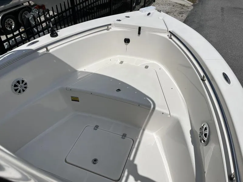 Slide: The Image of 2020 Bulls Bay 230 Center Console boat, spacious bow area with storage and speakers. - 5