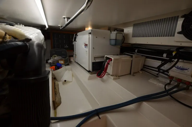 Slide: The Image of Engine room of 2006 Legacy Yachts Sedan with generator and equipment. - 18