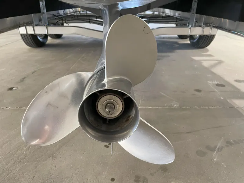 Slide: The Image of Propeller of 2024 Key West 239 FS boat on trailer, close-up view. - 16