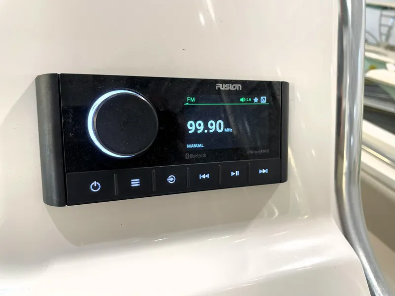 Slide: The Image of Fusion stereo system on 2024 Key West 239 FS boat, displaying FM 99.90 MHz. - 36