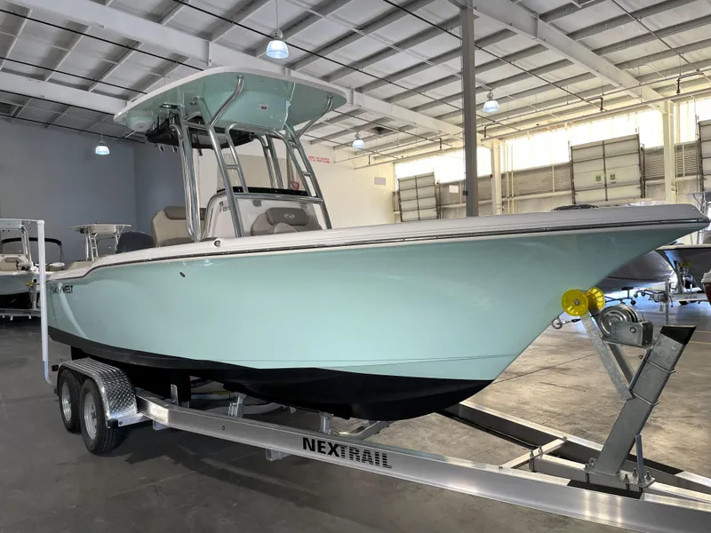 Slide: The Image of 2024 Key West 239 FS boat on trailer in indoor storage facility. - 4