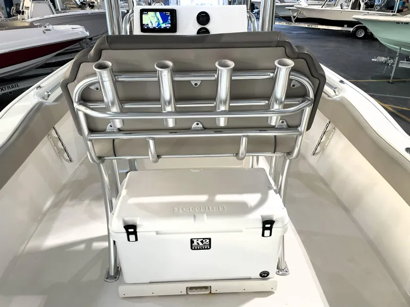 Slide: The Image of 2024 Key West 239 FS boat interior with rod holders and cooler. - 42