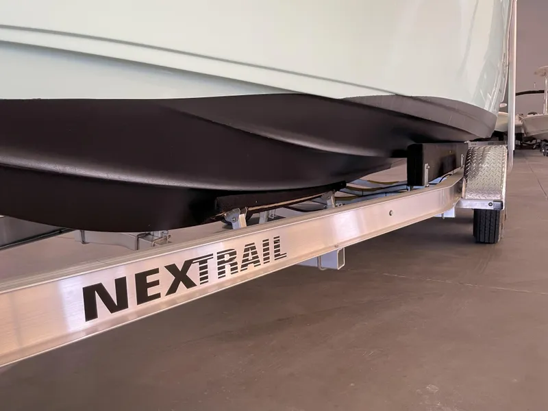 Slide: The Image of 2024 Key West 239 FS boat on Nextrail trailer, close-up view. - 50