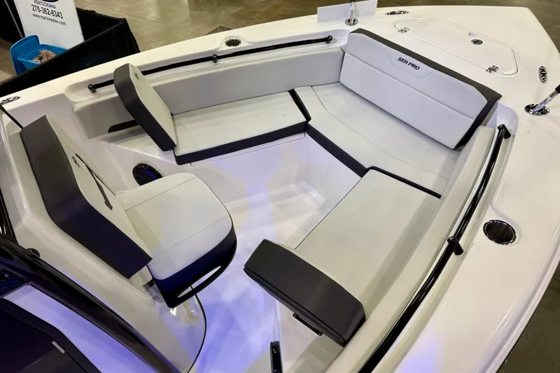 Slide: The Image of 2025 Sea Pro 225FLX Sandbar boat interior with sleek seating and modern design. - 17