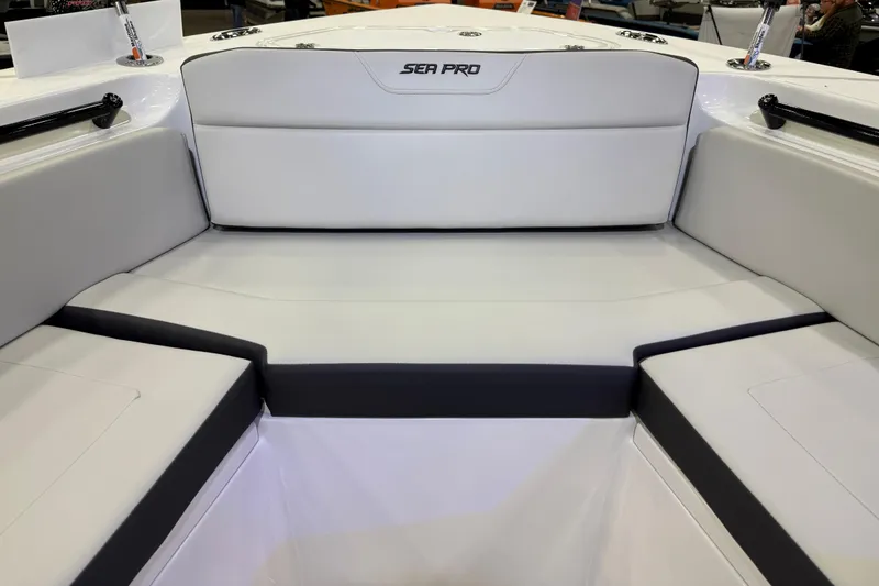 Slide: The Image of 2025 Sea Pro 225FLX Sandbar boat interior with cushioned seating. - 18