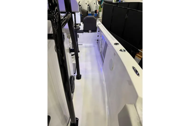 Slide: The Image of 2025 Sea Pro 225FLX Sandbar boat interior with sleek white deck and modern fittings. - 21