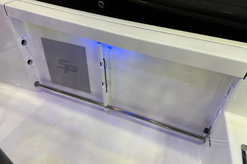 Slide: The Image of 2025 Sea Pro 225FLX Sandbar boat interior detail with blue LED lighting. - 22