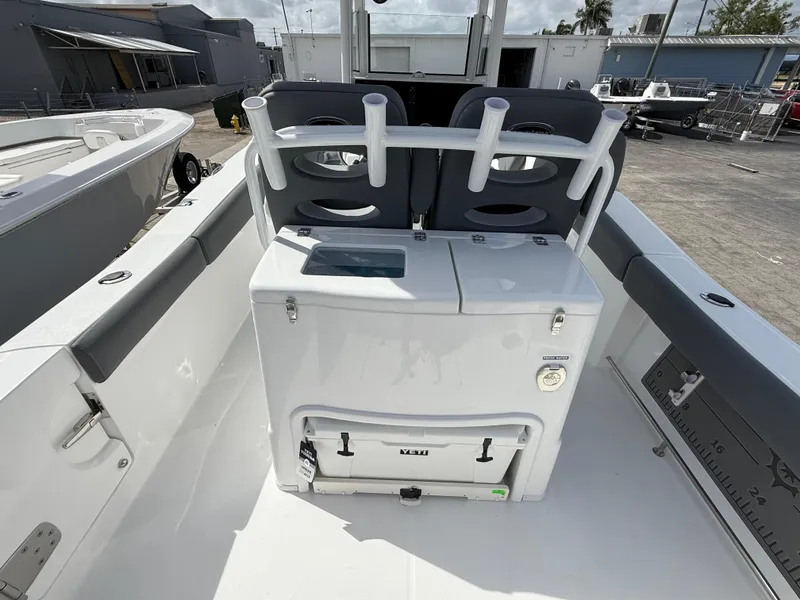Slide: The Image of 2025 NauticStar 292 Legacy boat interior with seating and storage compartments. - 14