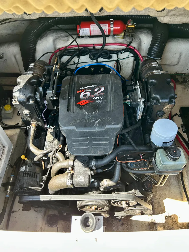 Slide: The Image of Engine compartment of a 2002 Sea Ray 270 Sundeck with MerCruiser 6.2 MPI engine. - 10