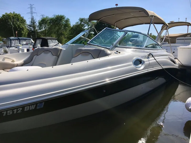 Slide: The Image of 2002 Sea Ray 270 Sundeck boat docked in marina, sunny day. - 23