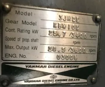 Slide: The Image of Yanmar diesel engine plate with specifications for Hunter 380, 1999 model. - 38