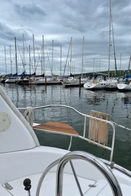 Slide: The Image of Sailboats docked at a marina, view from a 1999 Hunter 380 yacht. - 45