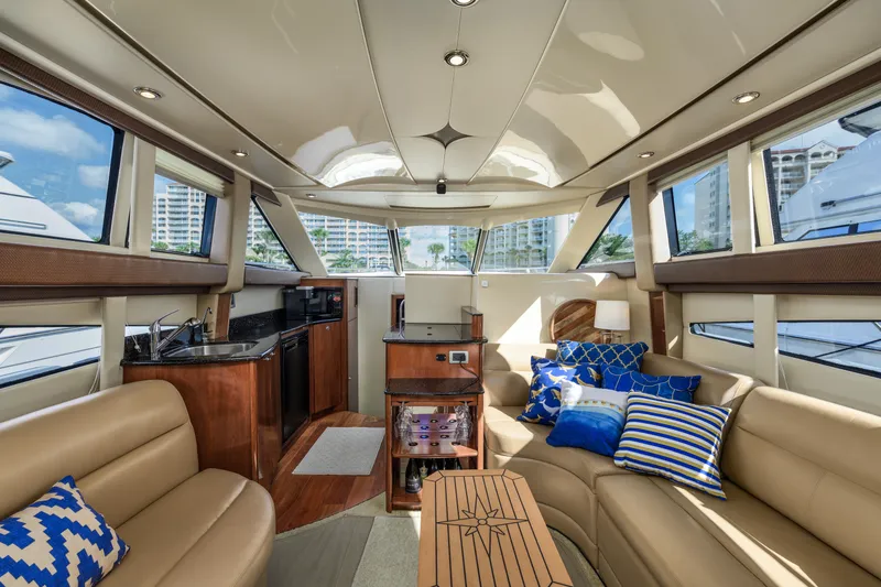 Slide: The Image of Luxurious interior of a 2008 Meridian 341 Sedan yacht with plush seating and modern amenities. - 22