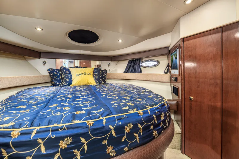 Slide: The Image of Luxurious bedroom interior of 2008 Meridian 341 Sedan yacht with elegant bedding. - 27