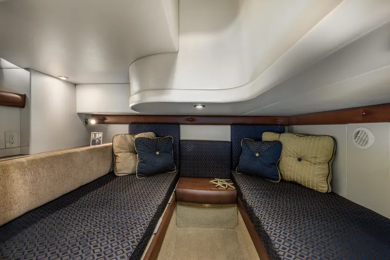 Slide: The Image of Interior cabin of 2008 Meridian 341 Sedan with cozy seating and decorative cushions. - 28