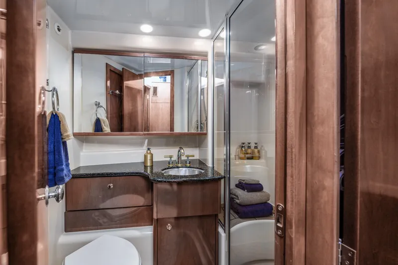 Slide: The Image of Luxurious bathroom in 2008 Meridian 341 Sedan yacht with modern fixtures and elegant design. - 29