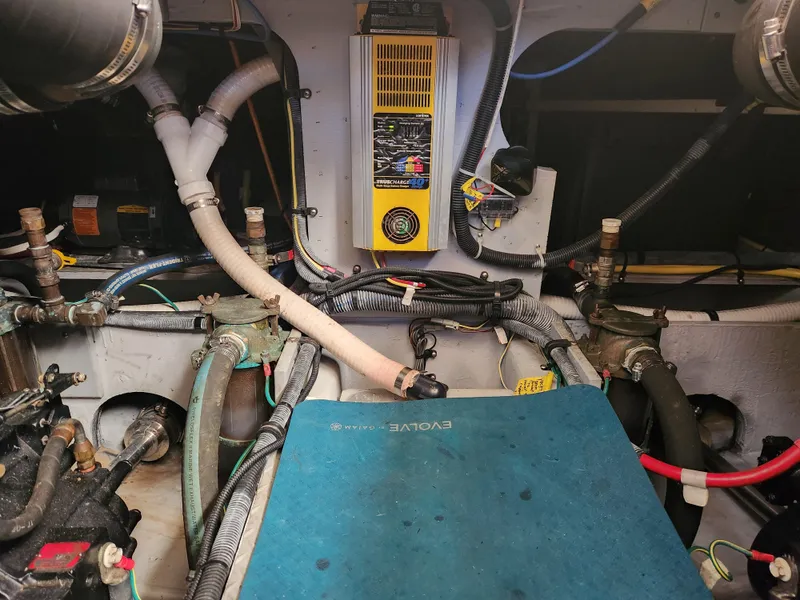 Slide: The Image of Engine room of a 2008 Meridian 341 Sedan with visible wiring and components. - 34