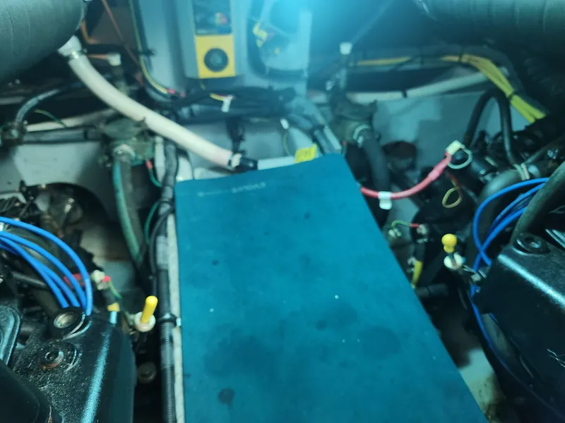 Slide: The Image of Engine room of a 2008 Meridian 341 Sedan with visible wiring and components. - 35