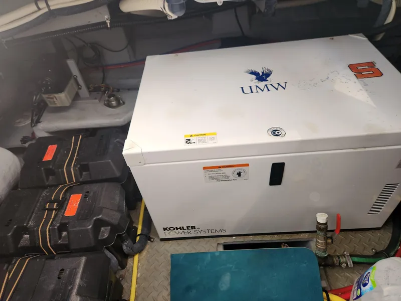 Slide: The Image of Engine room of 2008 Meridian 341 Sedan with Kohler power system and batteries. - 38