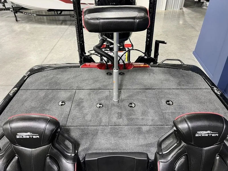 Slide: The Image of 2025 Skeeter ZXR20 boat interior with seating and fishing platform. - 21