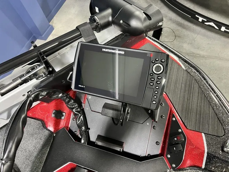 Slide: The Image of 2025 Skeeter ZXR20 boat dashboard with Humminbird Helix 7 fish finder. - 7