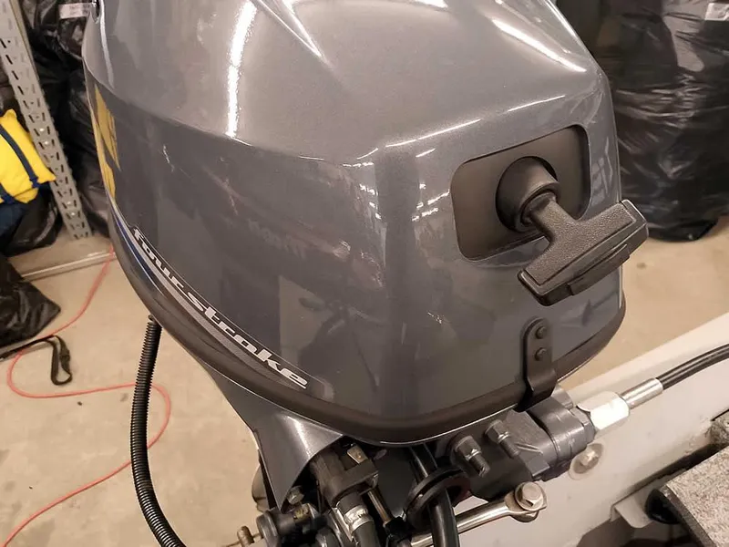 Slide: The Image of 2024 SeaArk 1652 Crappie boat motor, four-stroke engine, close-up view. - 25