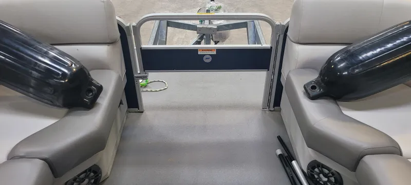 Slide: The Image of Interior view of a 2022 Godfrey Sweetwater SW2086 pontoon boat with seating and accessories. - 5