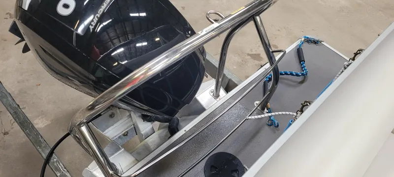 Slide: The Image of 2022 Godfrey Sweetwater SW2086 boat motor and deck with safety railings. - 6