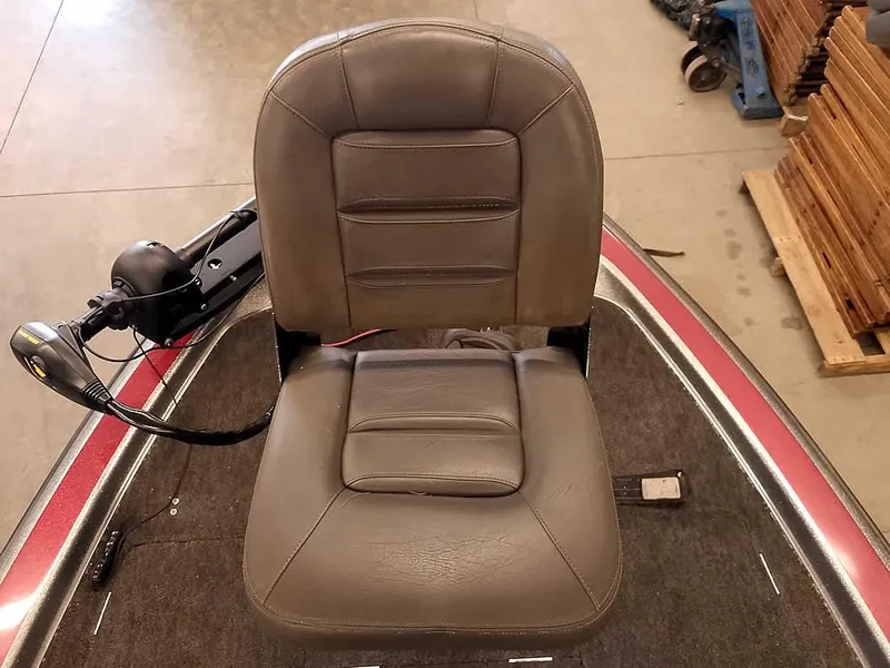 Slide: The Image of Gray boat seat on a 1999 Champion 171 model, indoor setting. - 18