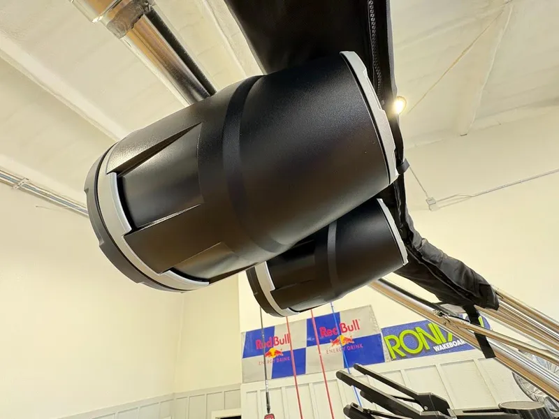 Slide: The Image of 2025 MasterCraft NXT23 boat speakers in a showroom setting. - 19