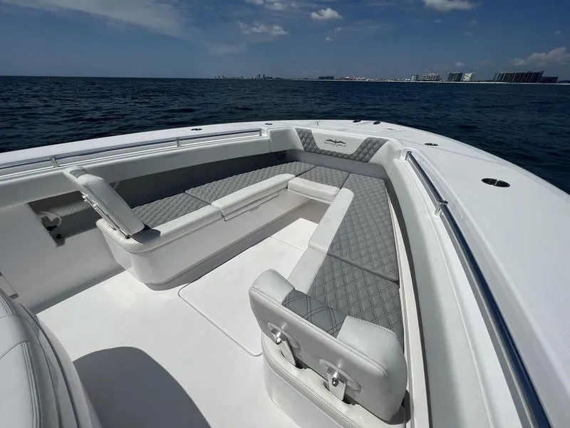 Slide: The Image of 2024 Invincible 43 Open Fisherman boat with spacious seating on open water. - 20