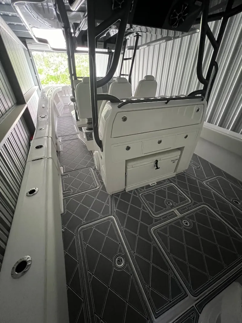 Slide: The Image of 2024 Invincible 43 Open Fisherman boat interior with sleek seating and modern design. - 34