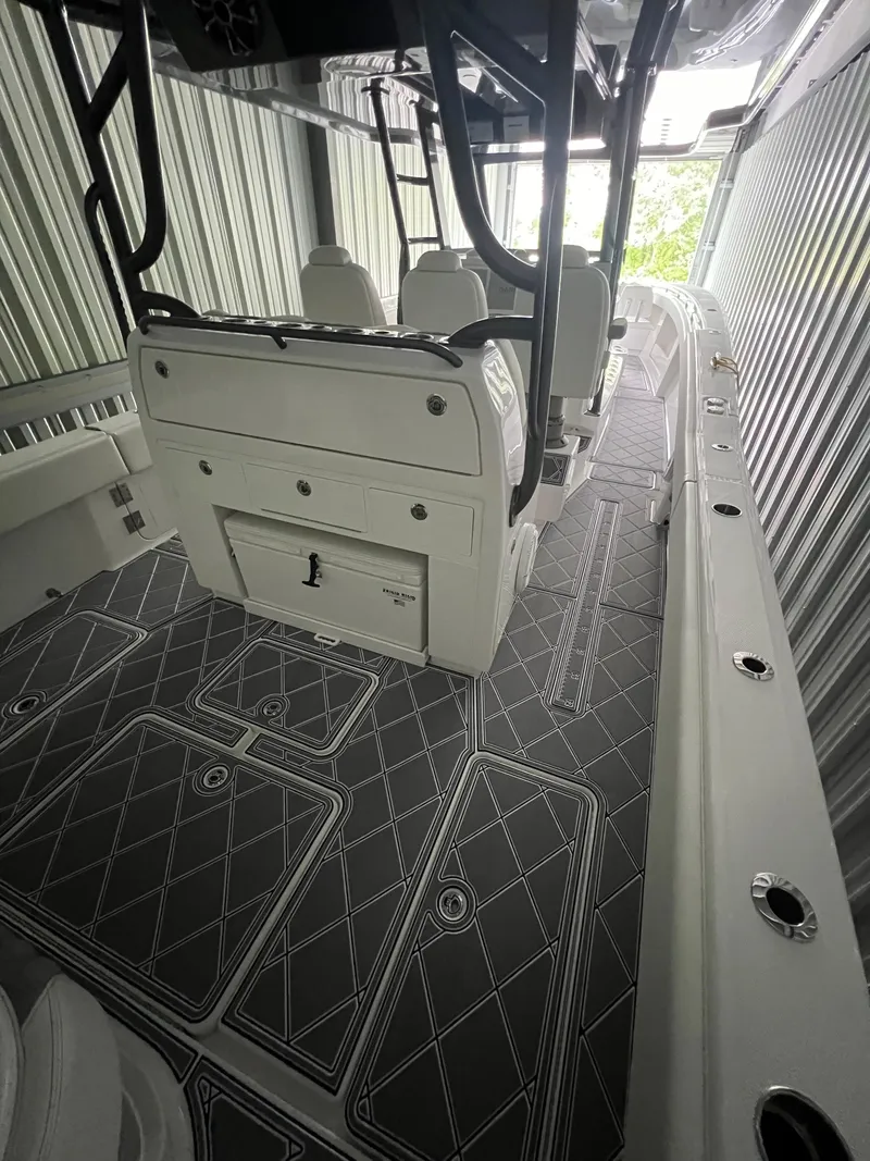 Slide: The Image of 2024 Invincible 43 Open Fisherman boat interior with sleek seating and modern design. - 35