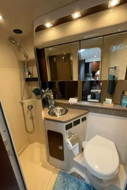 Slide: The Image of Luxurious bathroom in 2012 Cruisers Yachts 380 Express with modern fixtures and elegant design. - 21