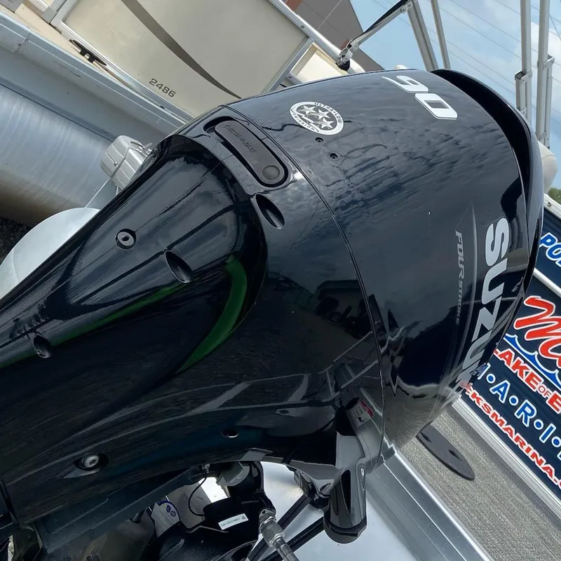 Slide: The Image of Outboard motor on a 2021 Godfrey Sweetwater 2286 SBX pontoon boat. - 8