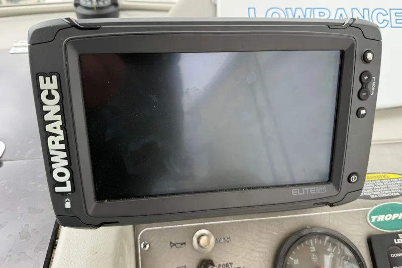 Slide: The Image of Lowrance Elite fishfinder on 2010 Trophy 2152 Walkaround boat dashboard. - 19