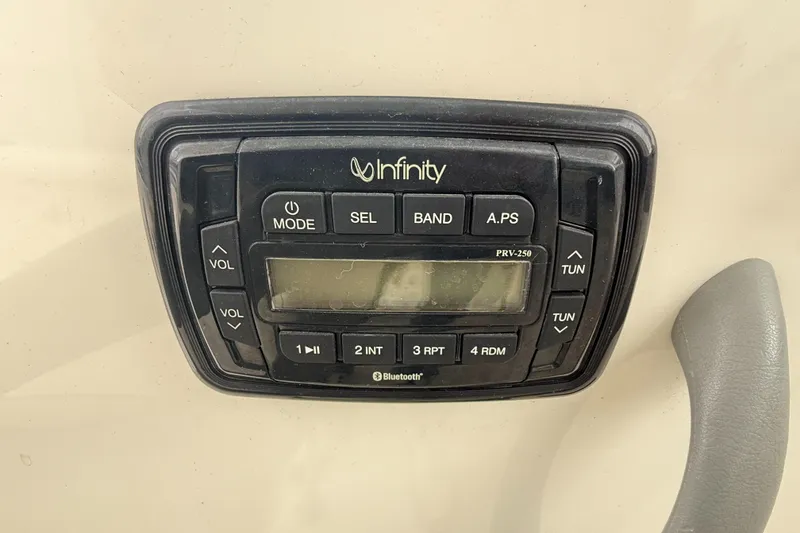 Slide: The Image of Infinity stereo system on 2010 Trophy 2152 Walkaround boat dashboard. - 22