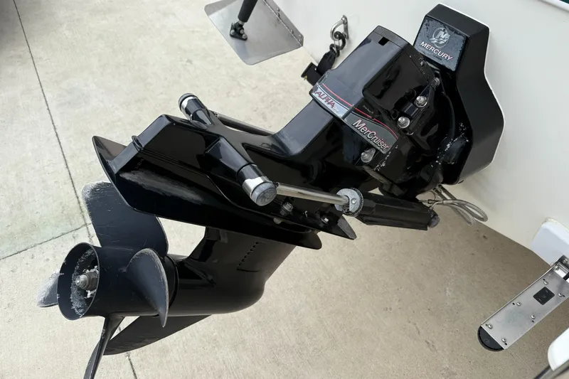 Slide: The Image of 2010 Trophy 2152 Walkaround boat with MerCruiser outboard motor, close-up view. - 25