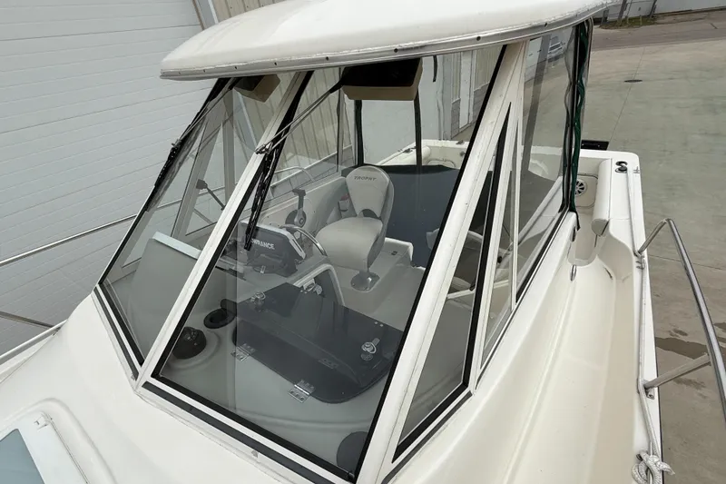 Slide: The Image of 2010 Trophy 2152 Walkaround boat with enclosed cabin and steering console. - 5