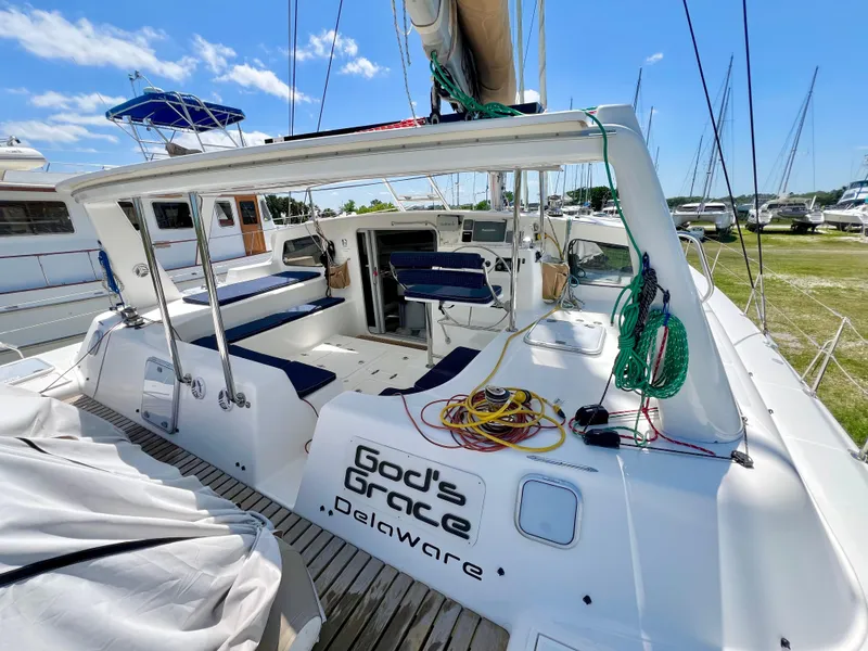 Slide: The Image of Voyage Yachts 500 sailboat, 2010 model, docked with visible seating and equipment. - 19