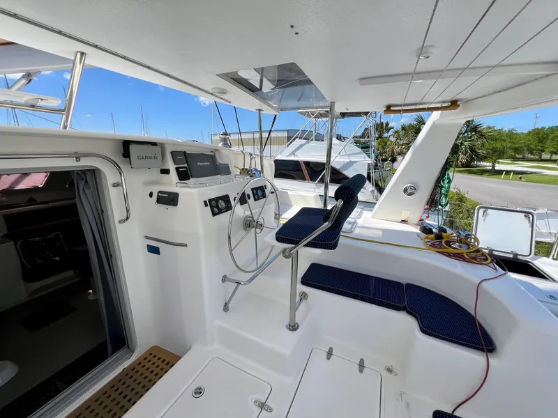 Slide: The Image of Cockpit of 2010 Voyage Yachts 500, featuring navigation equipment and seating. - 23
