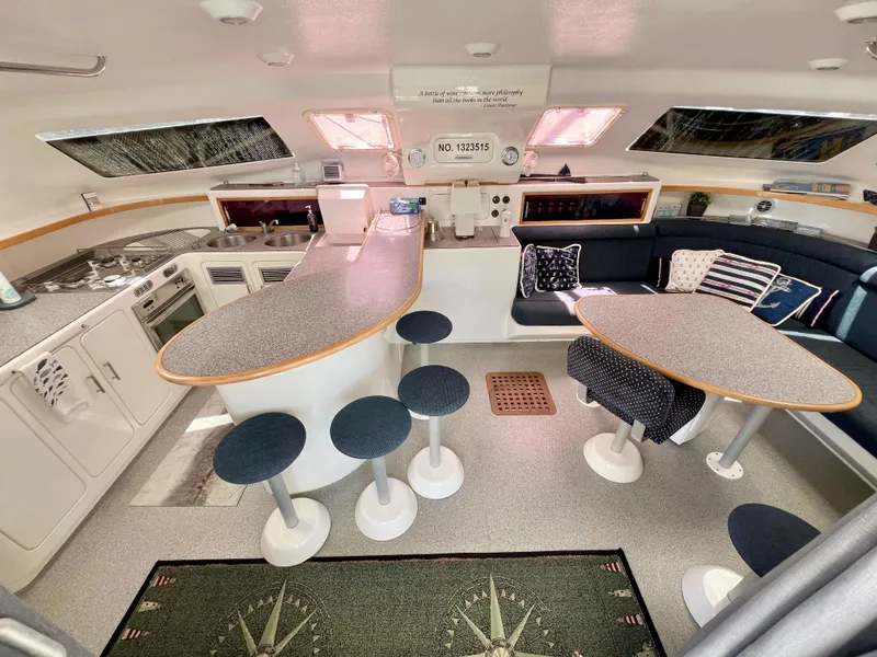 Slide: The Image of Spacious interior of 2010 Voyage Yachts 500 with modern kitchen and seating area. - 26